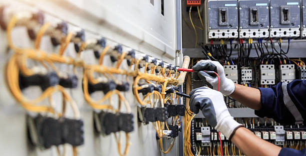 Professional Electrician technician working in Deerfield Beach, FL